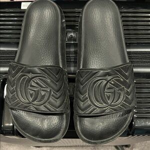 Gucci Embossed Black Slides in good condition